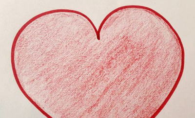 picture of red crayon and marker heart